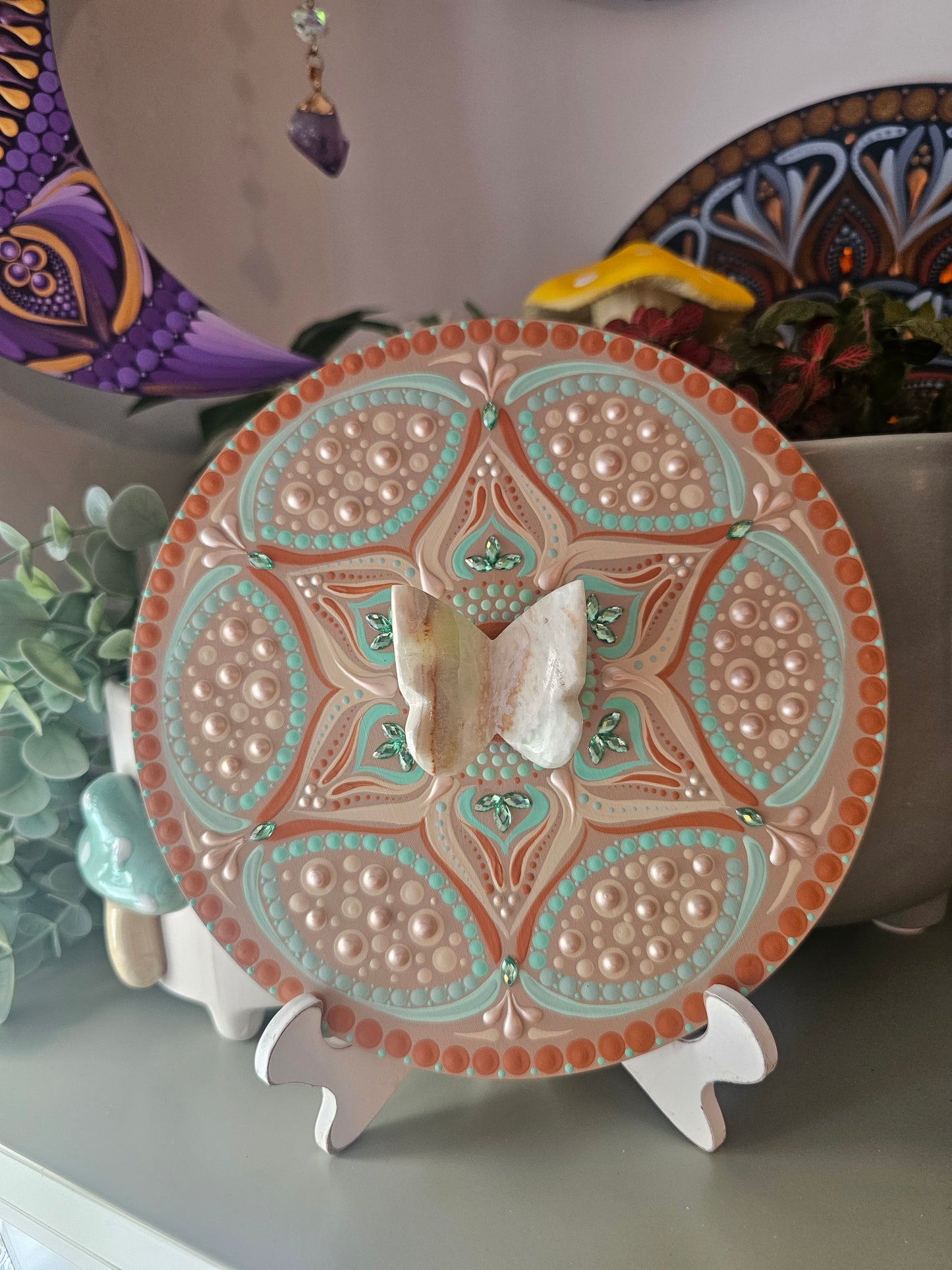 Mandala avec papillon de calcite bleu des caraïbes